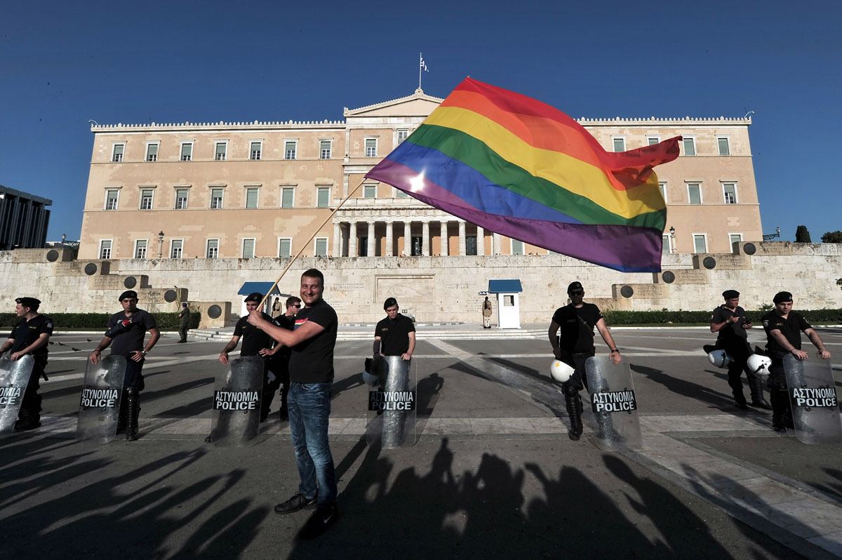 Crédits Photo -- Louisa Goulia-Maki, Aris Messinis/AFP/Getty Images